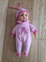 Süsse Baby Puppe, rosa mit Mütze und Töne