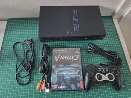Playstation 2 console with V-Rally 3 and controller