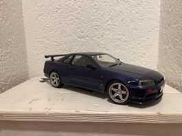 Modellauto Nissan Skyline R34 GT-R dunkelblau guter Zustand