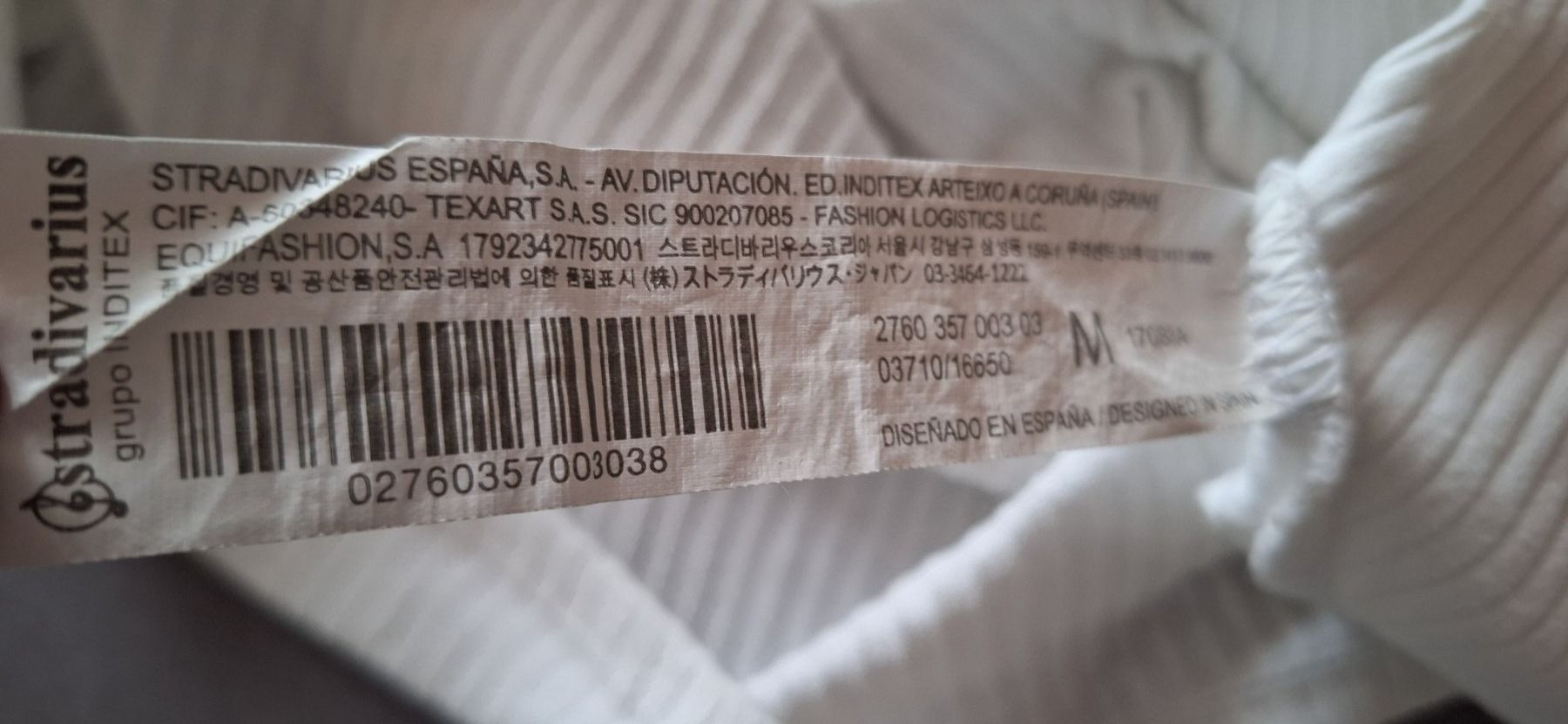 Stradivarius Top: Stradivarius, haut blanc – Usato da Lussery-Villars venduto da pousinete02 4