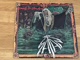 SATAN. 1983. court in the act