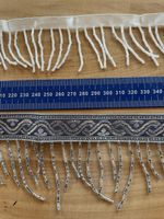 Textilband mit Perlen
