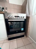 Cuisinière vitrocéramique Beko inox occasion bon état