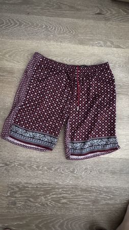 Alexander McQueen pantaloncini stampati rossi taglia M nuovo