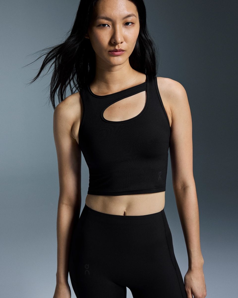 Top: On running - studio cut out crop  – Nuovo (secondo la descrizione) da Zürich venduto da Hanna-Hadorn 1
