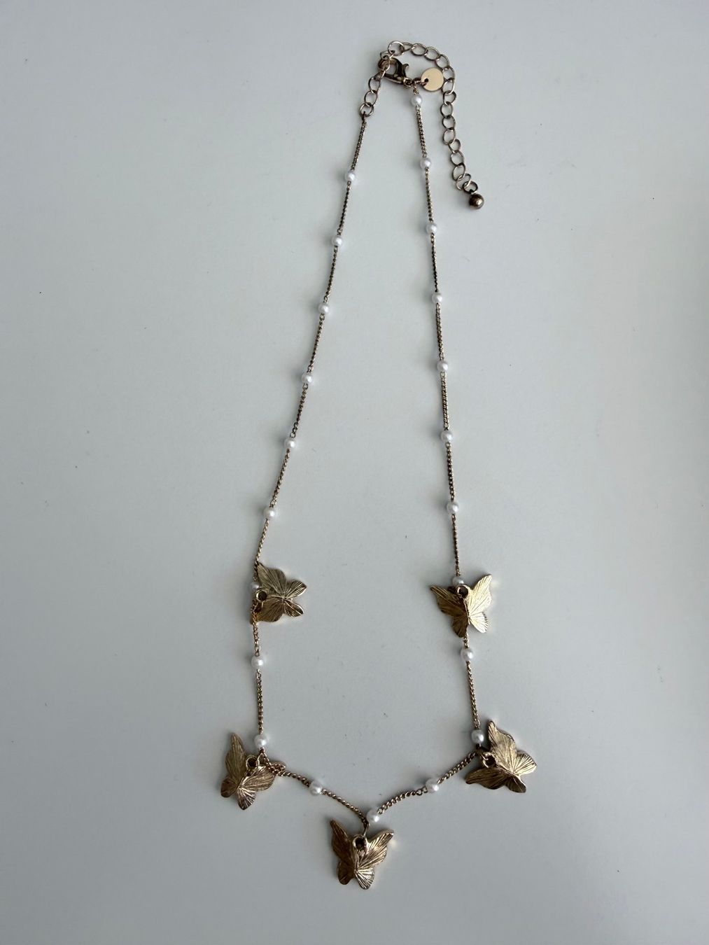 Catenine: Modeschmuck Kette Schmetterlinge 19 cm goldfarbend – Usato da Kirchdorf AG venduto da coco123