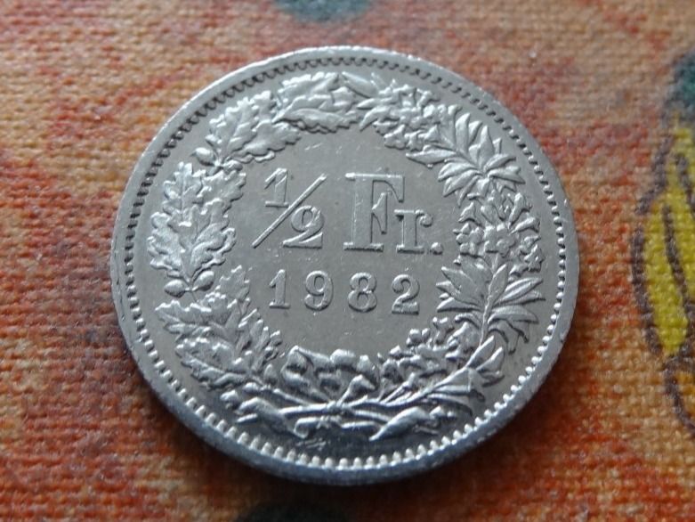 Tutti le monete: 1/2 Fr. 1982 – Usato da Romanel-sur-Lausanne venduto da Swift13
