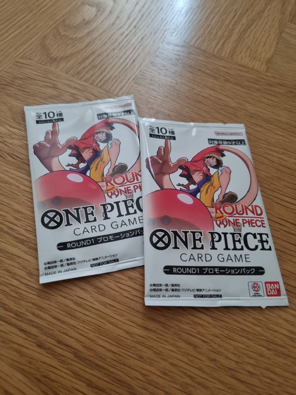 Bandai Sammelbilder & Trading cards: Booster one piece × round 1  – Neu und originalverpackt aus Genève von Mickapoke