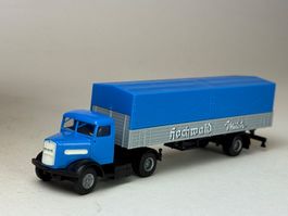 GB1- Brekina MAN Pritschensattelzug Hochwald Milch