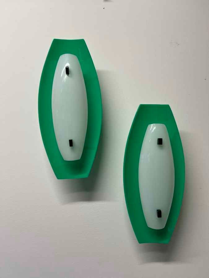 Guzzini Lampade: Harvey Guzzini Wandleuchte 1970 – Usato da Pregassona venduto da ModernistaCH