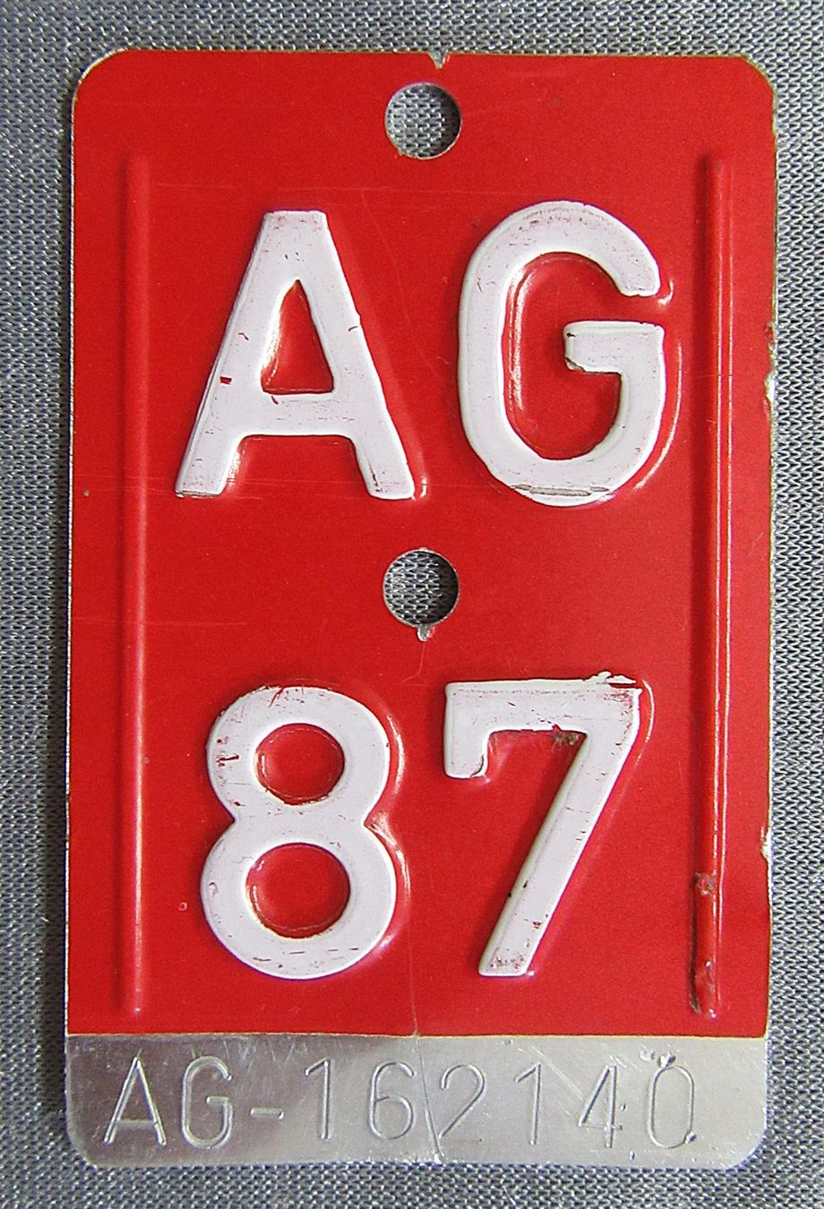 Insegne: Velonummer - Fahrradnummer - AG 87 – Usato da Auenstein venduto da Padabimbim