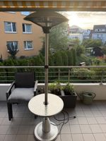 Standing patio heater with integrated table acceptable