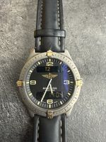 Montre Breitling Navitimer quartz titane bracelet cuir