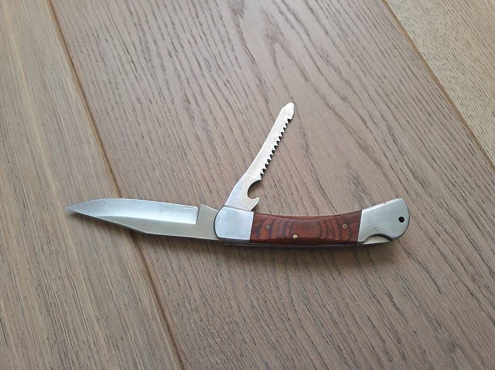 Taschenmesser: Robustes Klappmesser / 10cm Klinge und Säge – Gebraucht aus Ennetbürgen von Riwemogmbh