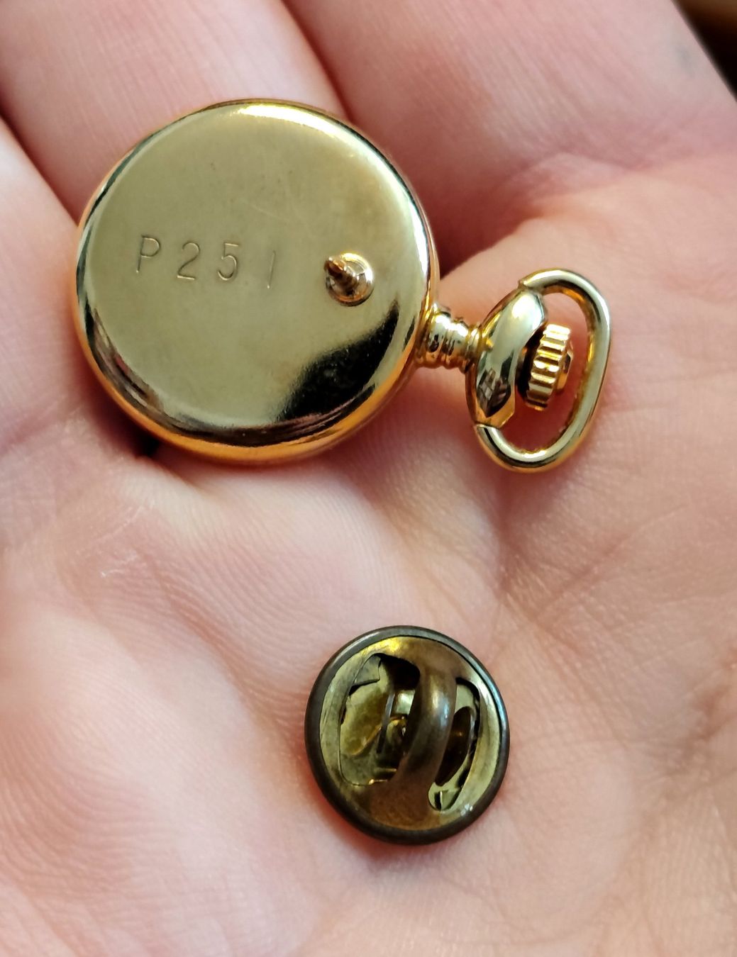 Orologi: Mini montre : "Le Pin's oly" – Usato da Neuchatel venduto da Vale-1976 1
