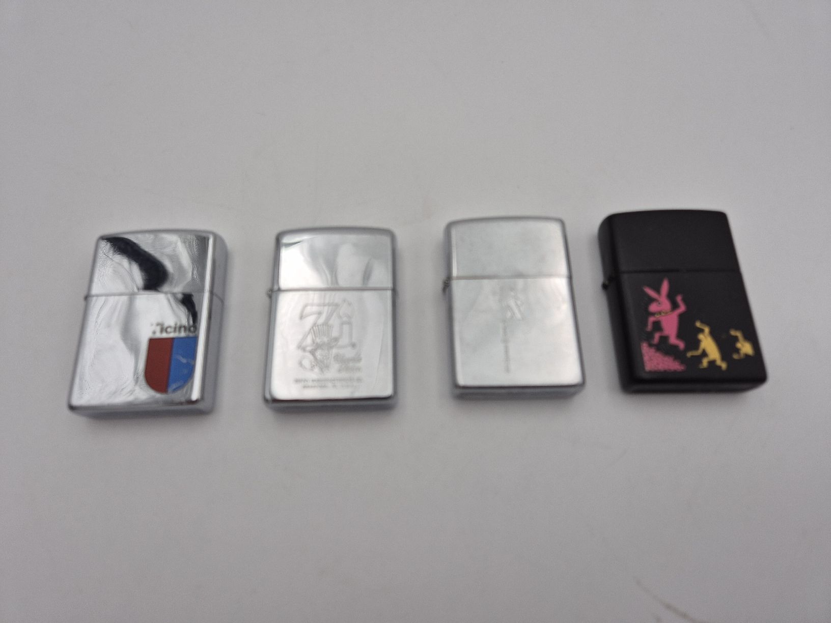 Zippo Feuerzeuge: 4 Briquets Zippo – Gebraucht aus Chambrelien von