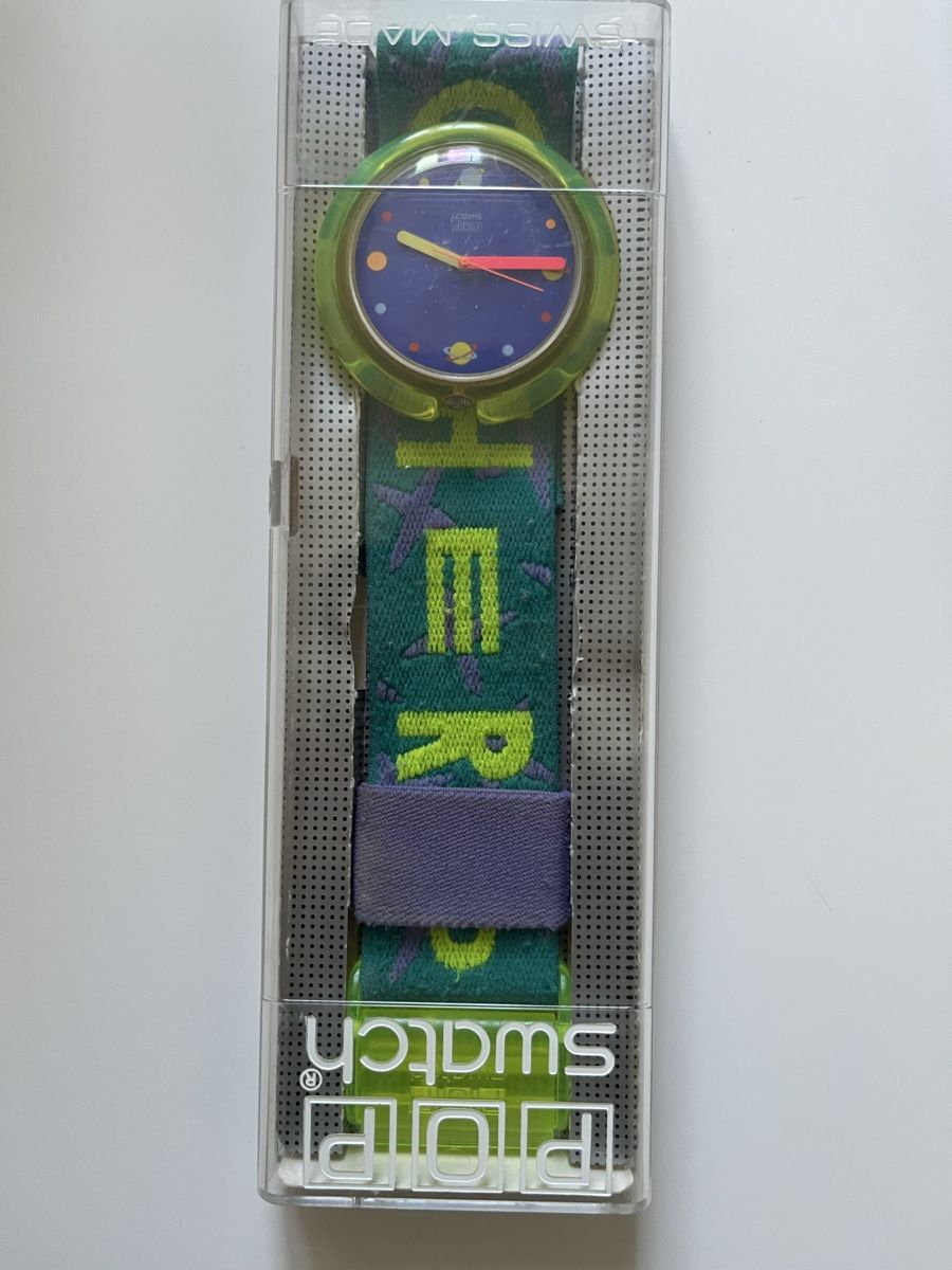 Swatch Uhren: Pop Swatch Multicolor Cubist Style dial, red/blue strap  – Neu und originalverpackt aus Küsnacht ZH von mar_x6fy