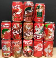 13 alte unterschiedliche Coca-Cola Dosen mit Santa Claus
