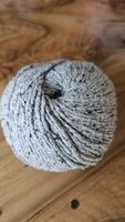 100% Seide Grau meliert, 50g/ 95m