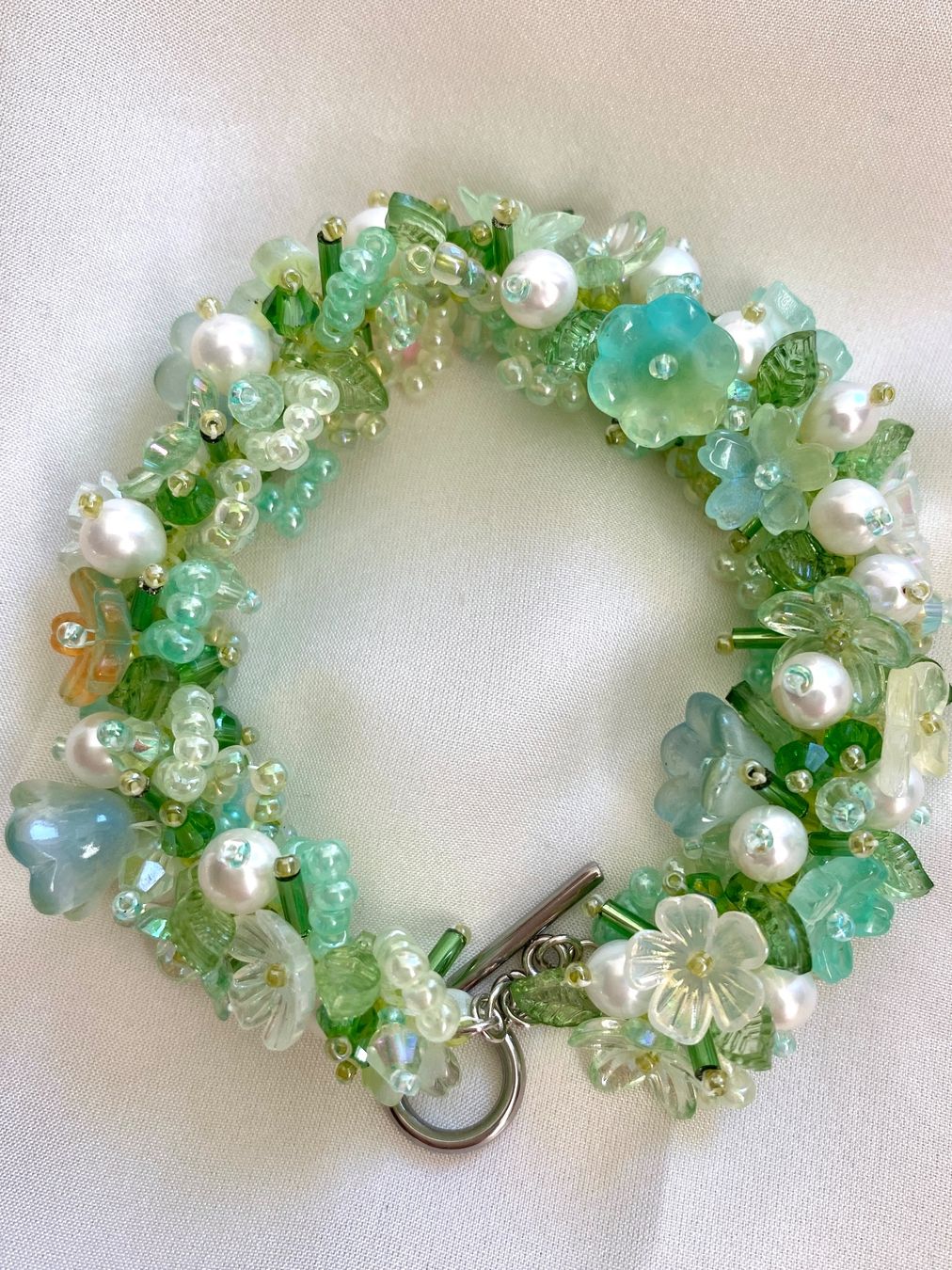 Bracciali & Braccialetti: Blumen Süsswasserperlen Armbänder – Nuovo e nell'imballaggio originale da Sarnen venduto da catnini