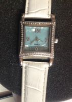 Jolie montre Dame - brillant - bracelet neuf - pille neuve