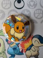 Badge Pokémon Évoli Exclusivité Gem pack chinois