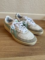 Baskets blanc/turquoise Onutsika Tiger, p.37