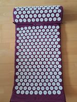 Tapis d'acupression violet en bon état
