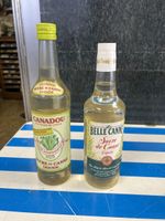 2 ANCIENNES BOUTEILLES SUCRE DE CANNE LIQUIDE 