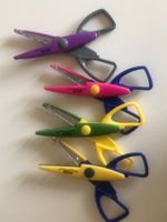 Kinderscheren mit Wellenschliffen, Reuser