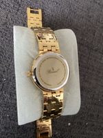 Montre femme Bassel dorée, élégance intemporelle.