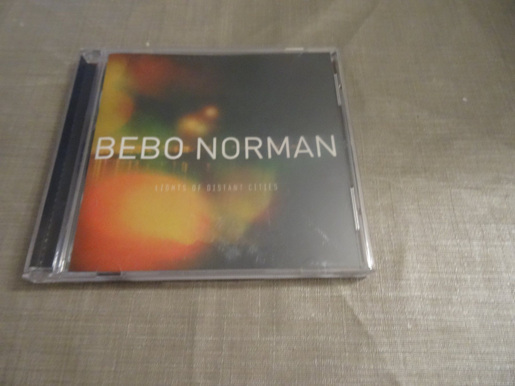 CD: Bebo Norman - Lights of distant cities CD – Usato da Olten venduto da Disc-Ausverkauf