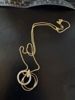 A/C Halskette goldfarben mit Strass-Ringen