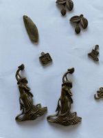 8 Schmuckanhänger bronzefarben