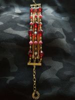 Armband von PHANTASYA goldfarbig orange-rot