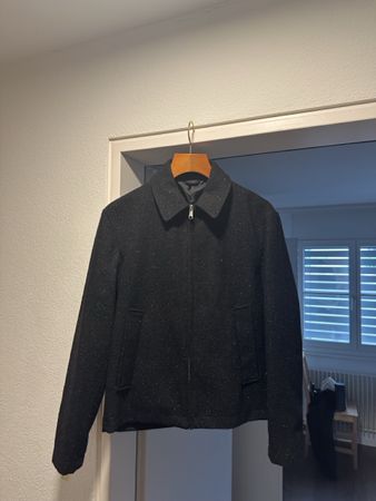 Glenzende schwarze Zarajacke verhandelbar