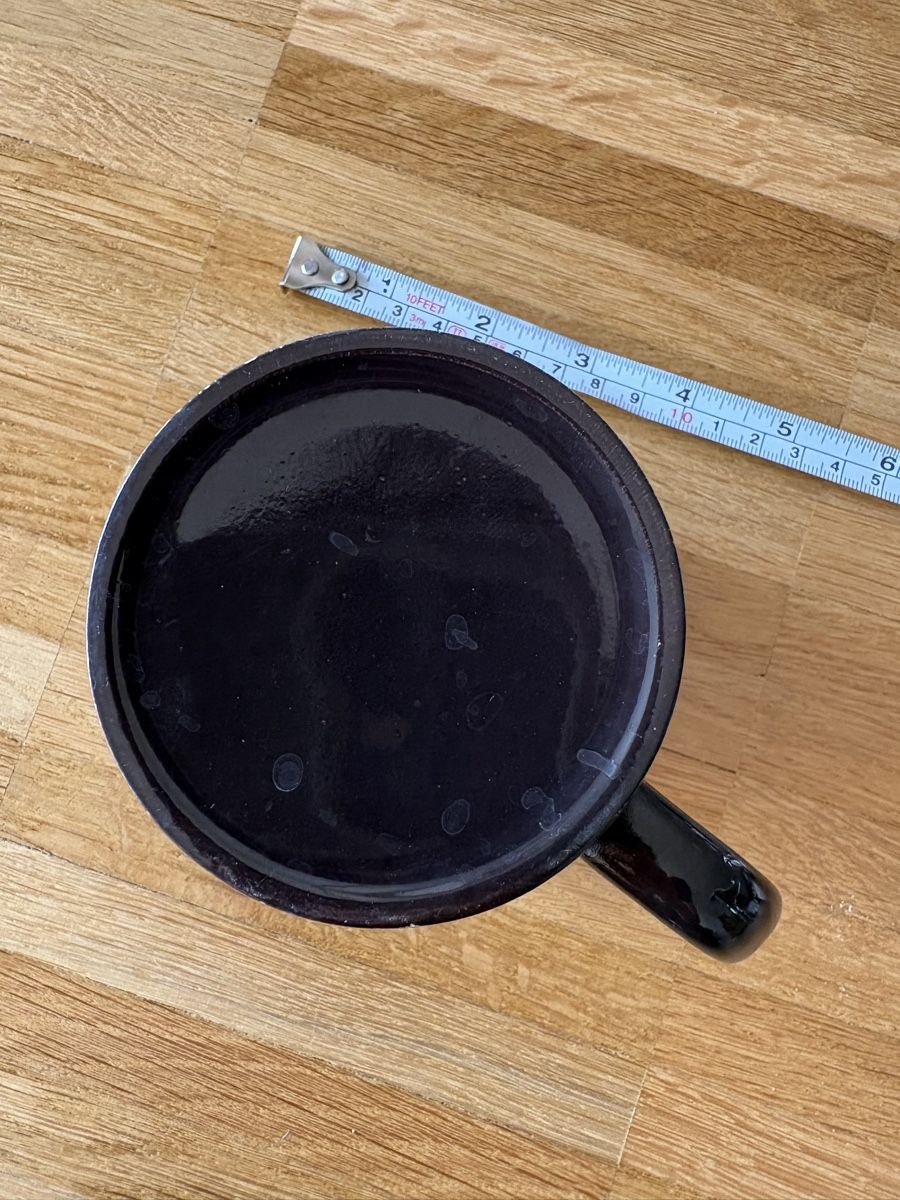 Tazze: Tasse noire avec révélation chaleur – Usato da Fribourg venduto da bappenzell 1