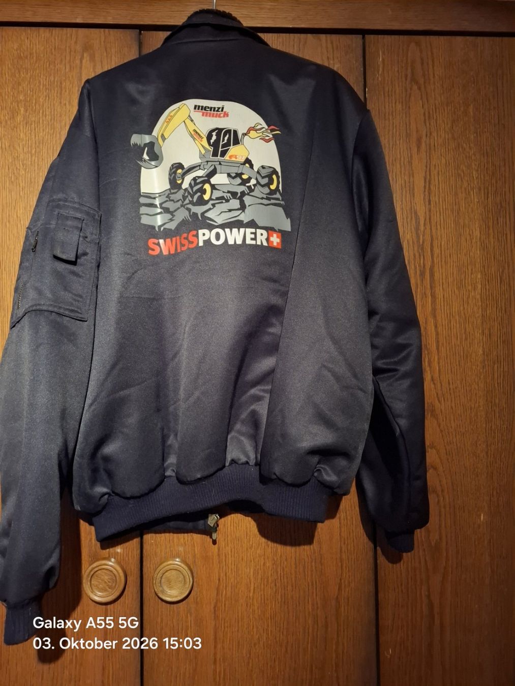 Menzi Muck Jacken: Menzi Muck Jacke – Gebraucht aus Bilten von Plangg 1