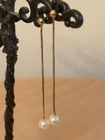 18 Karat Goldohrring mit Perlen