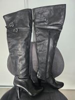 Bottes Cuissardes "VidéoClip" en cuir Noir à talon.