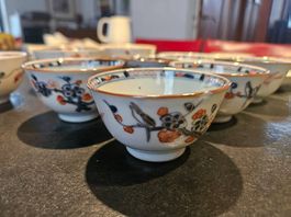 15 Porzellanschalen  florale Dekore in Blau/Rot