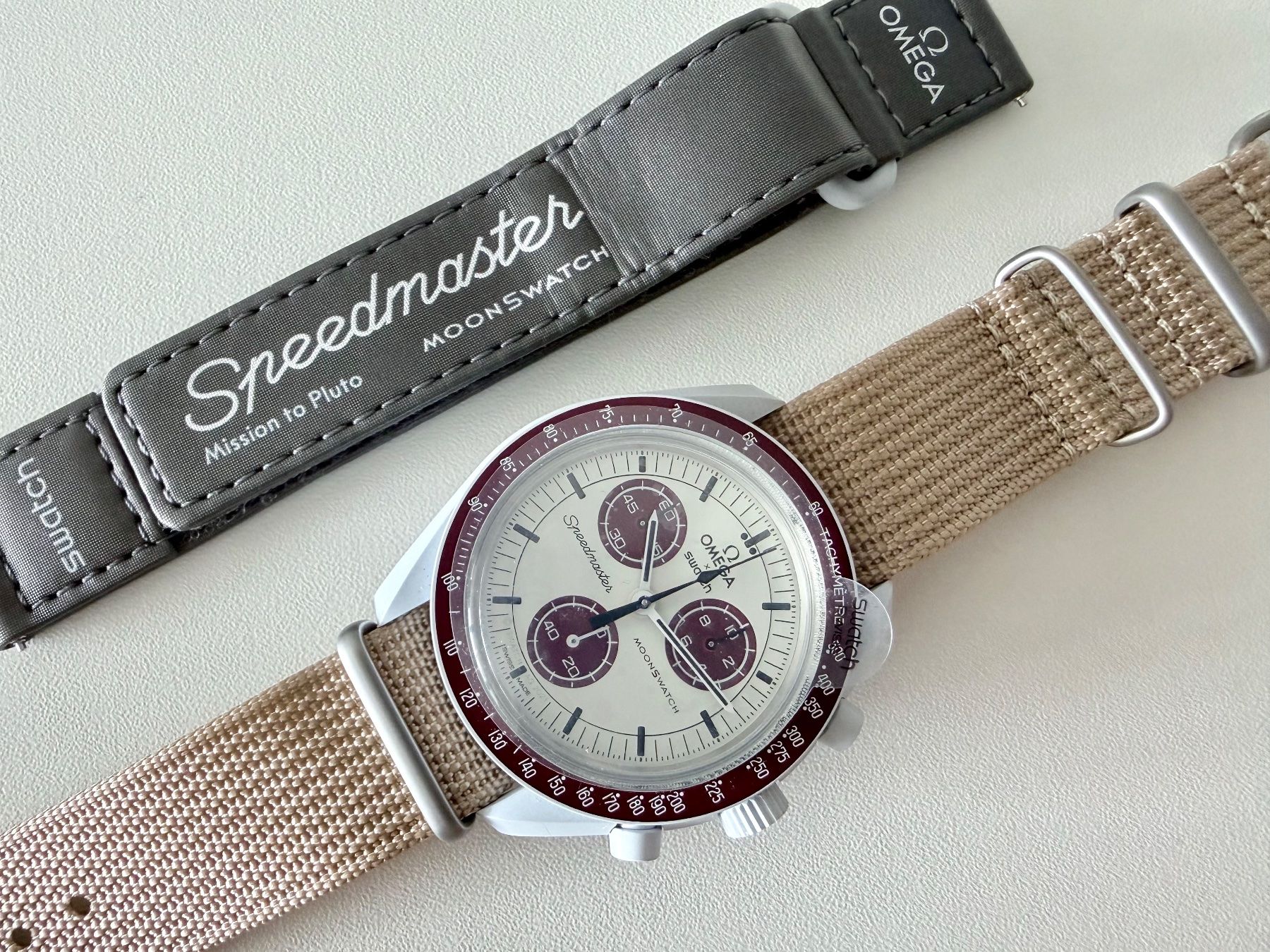Swatch Orologi: OMEGA x SWATCH Mission to Pluto "Safari", NO box & papers – Nuovo (secondo la descrizione) da Le Mont-sur-Lausanne venduto da LycaGallery