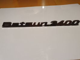 Datsun 2400 Emblem   ,  versand kosten  für 14.-Fr.