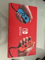 Nintendo Switch complète peu utilisée avec un jeu.