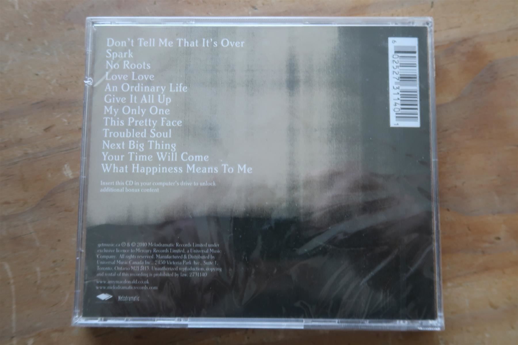 CDs: AMY MACDONALD - A CURIOUS - NEUE CD OVP – Neu und originalverpackt aus Basel von Patiscat 1