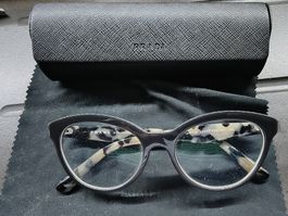 Lunettes de vue Prada gris et branches léopard effet cat eye
