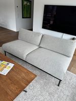 Light Gray Two-Seater Sofa and a corner section