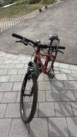 Mountain bike red black frame acceptable condition
