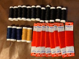 25 Fächtli, Beigarn, Wolle, schwarz, rot, blau, gelb