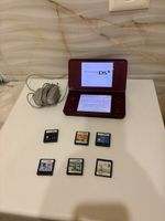 Nintendo DSi XL + 6 jeux + chargeur